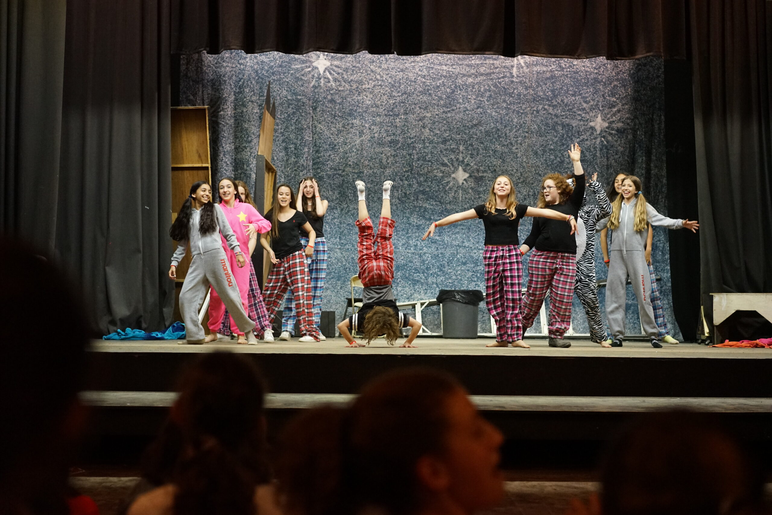 Campers performing on stage