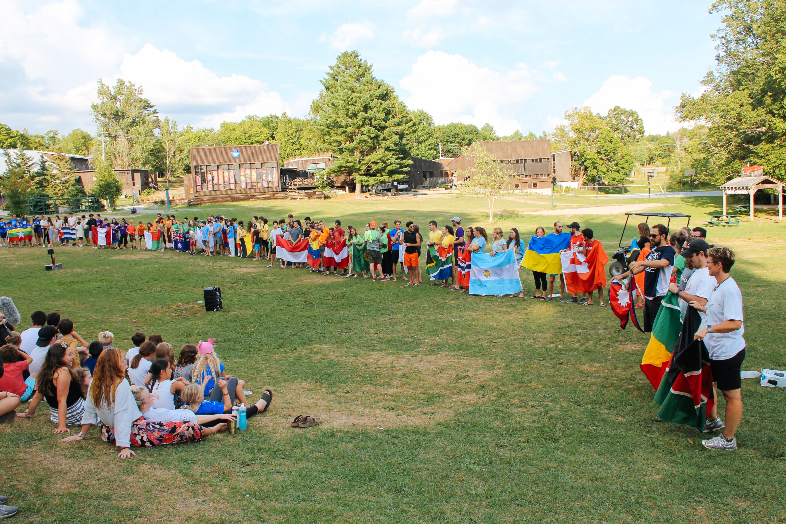 Campers showing off world flags